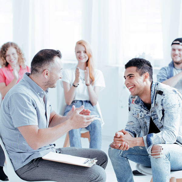 happy people during a group therapy
