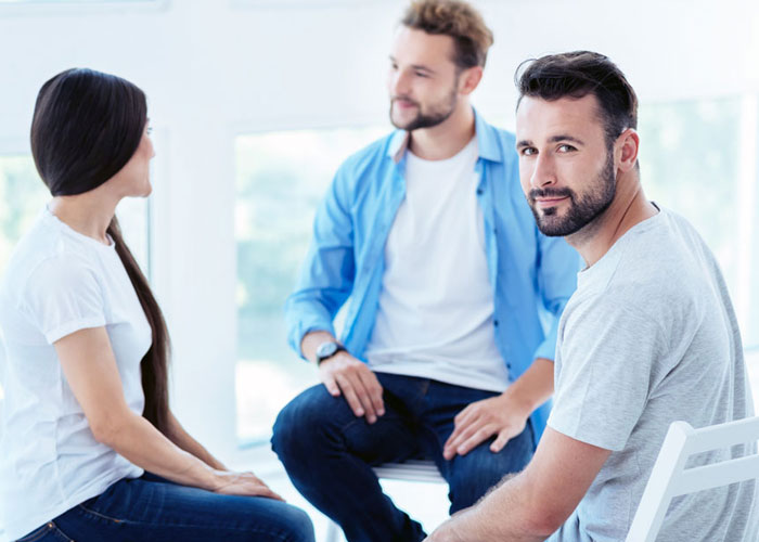 people during therapy at a drug rehab