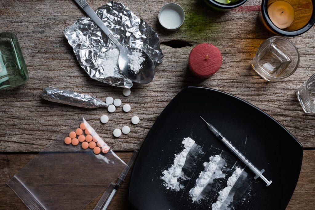 drugs pills on a wooden background