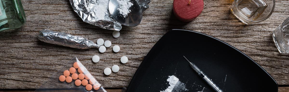 drugs pills on a wooden background
